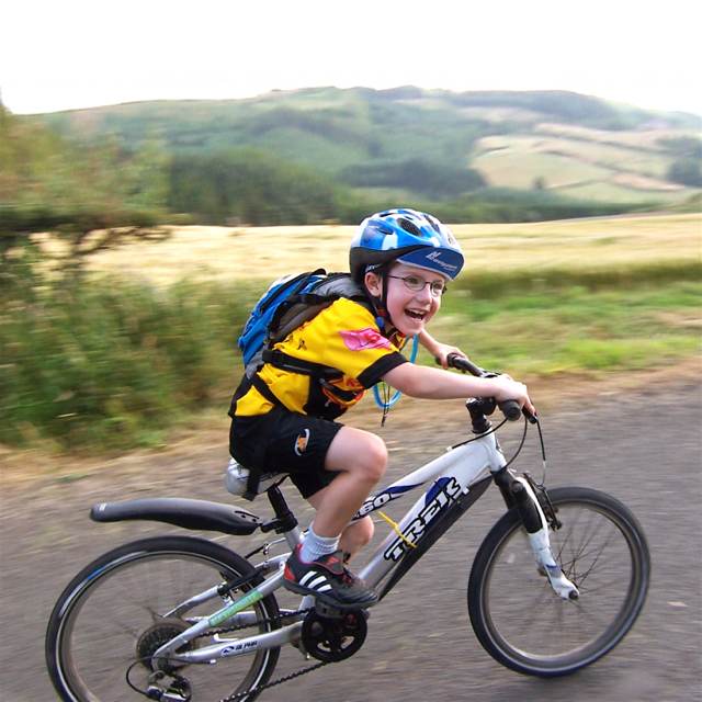 child riding bike withouth training wheels